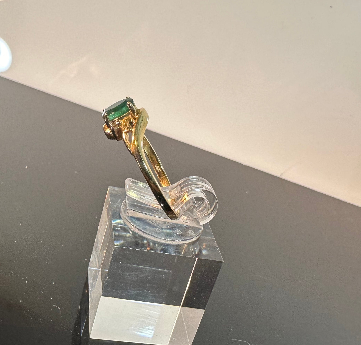 Emerald ring in 10K gold with small diamond accents