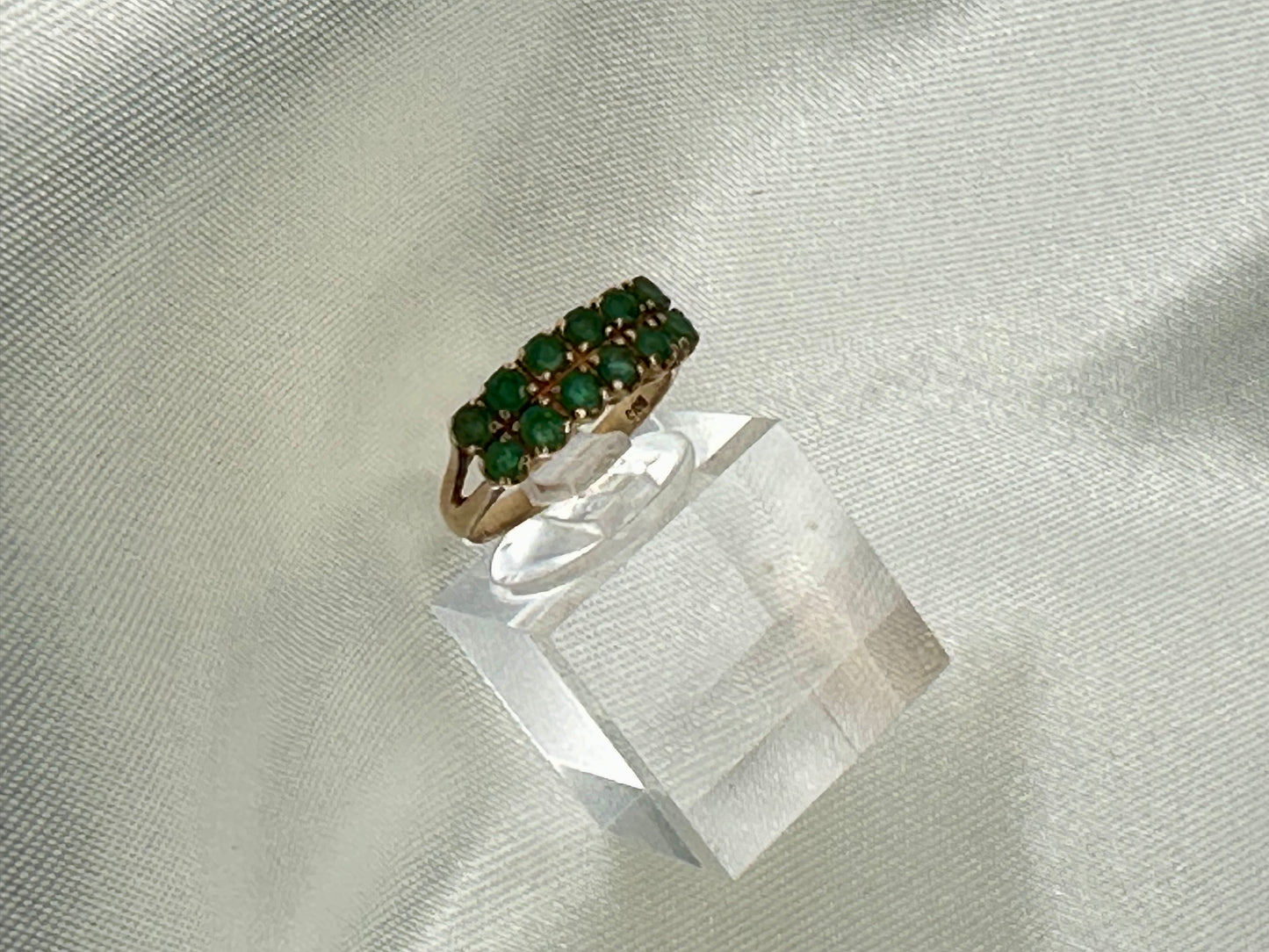 14K gold ring with 12 round cut Emeralds