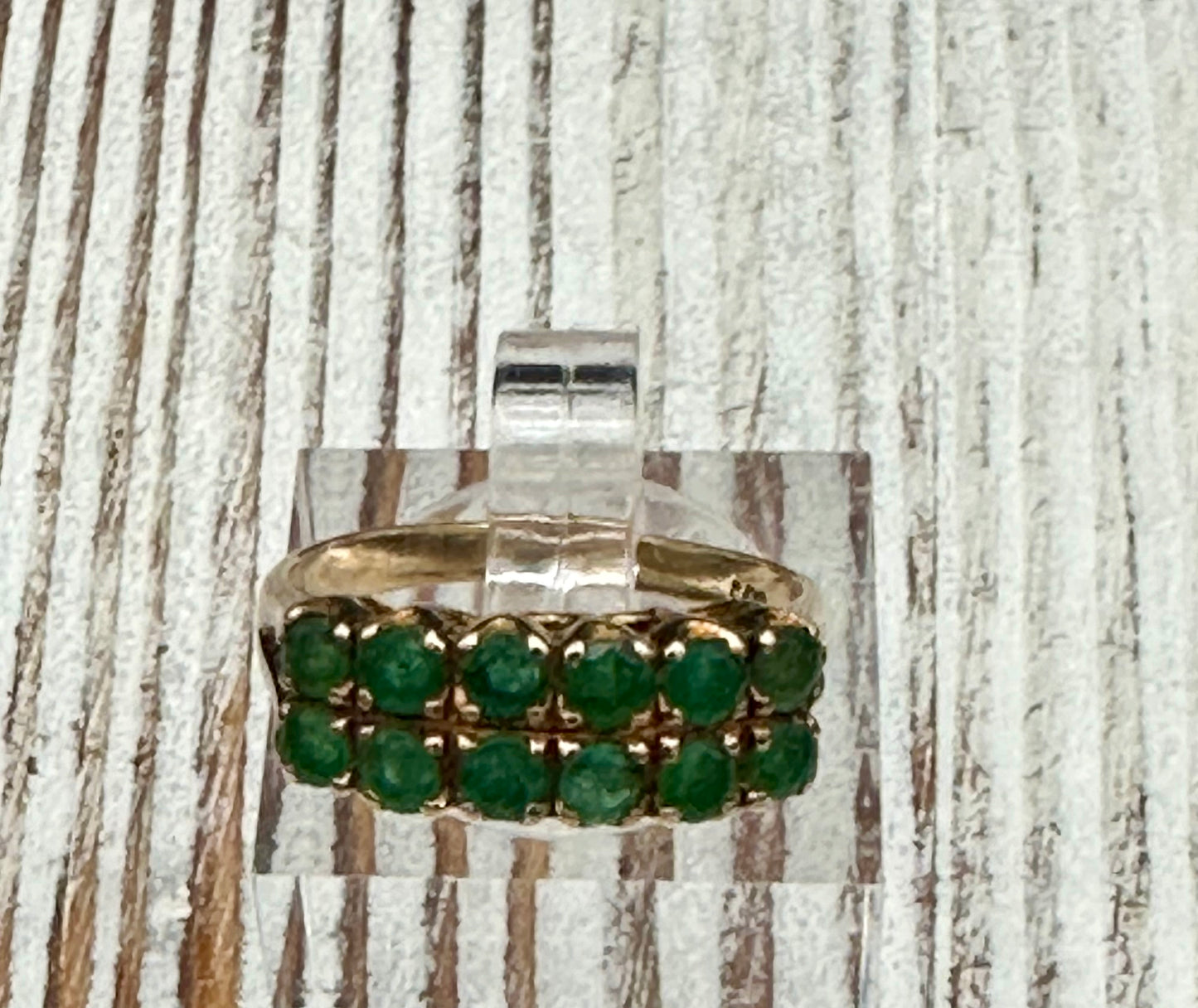 14K gold ring with 12 round cut Emeralds