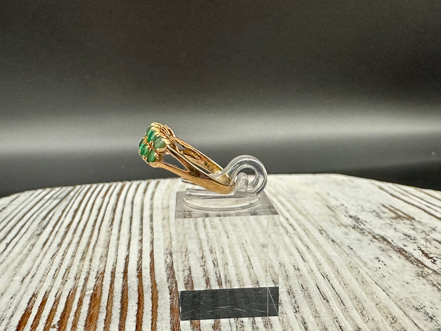 14K gold ring with 12 round cut Emeralds