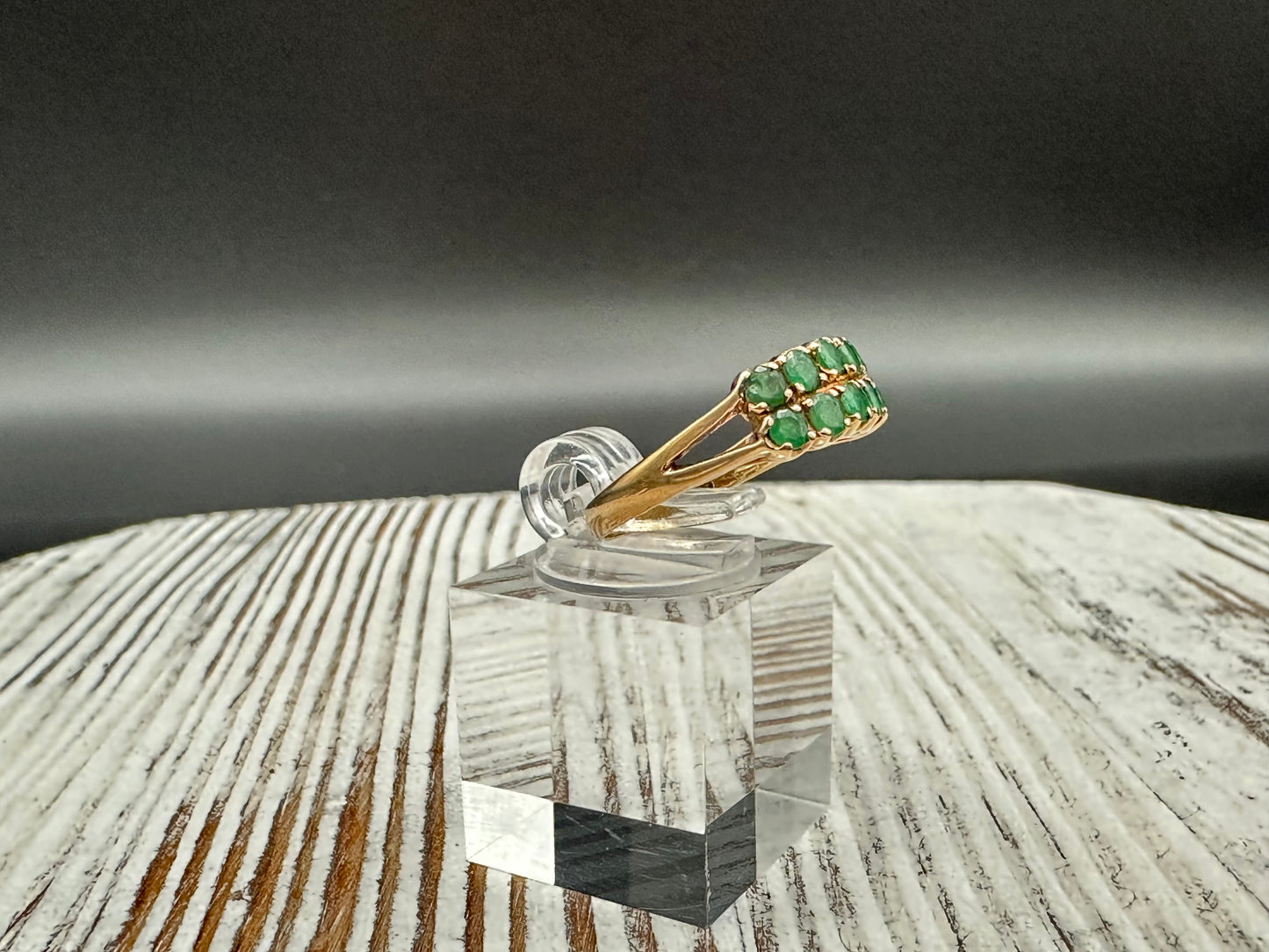 14K gold ring with 12 round cut Emeralds