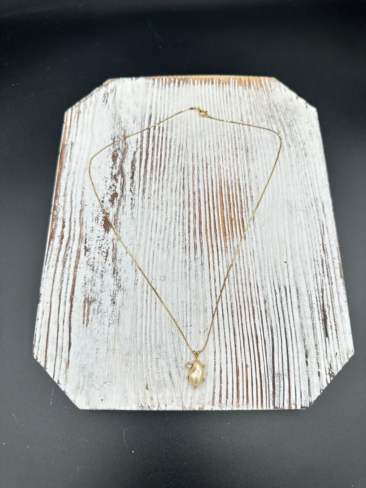 Faux pearl and Diamond pendant on Gold tone chain