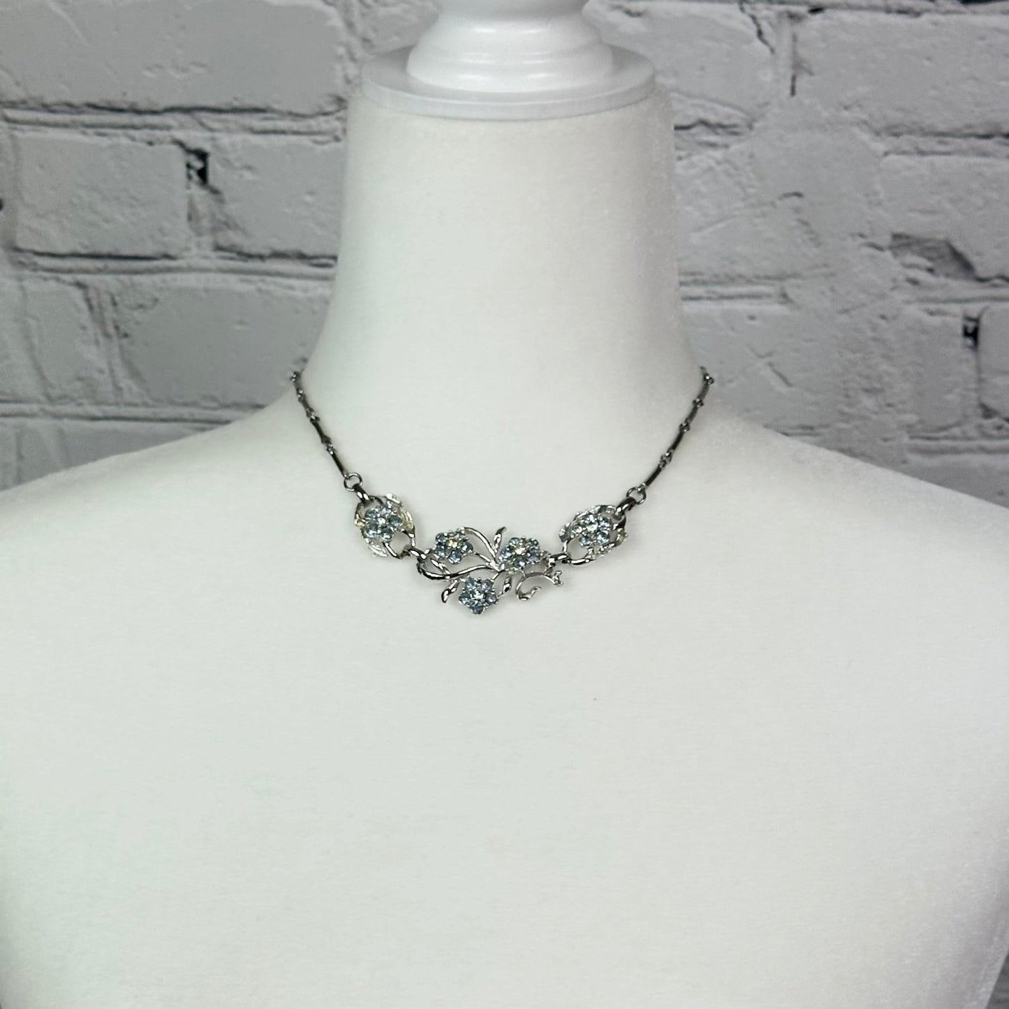Aquamarine and White Crystal floral spray set in Rhodium Plating Necklace