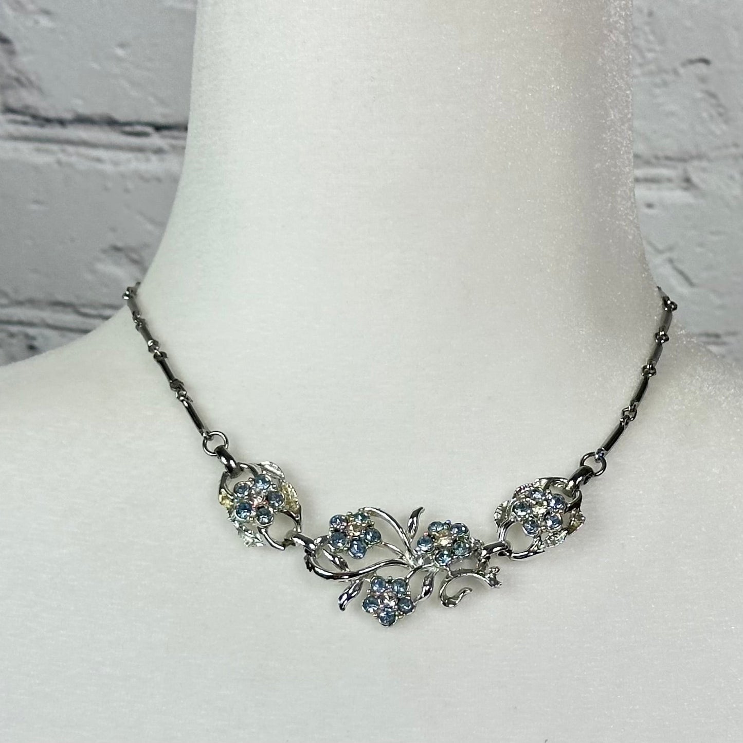 Aquamarine and White Crystal floral spray set in Rhodium Plating Necklace