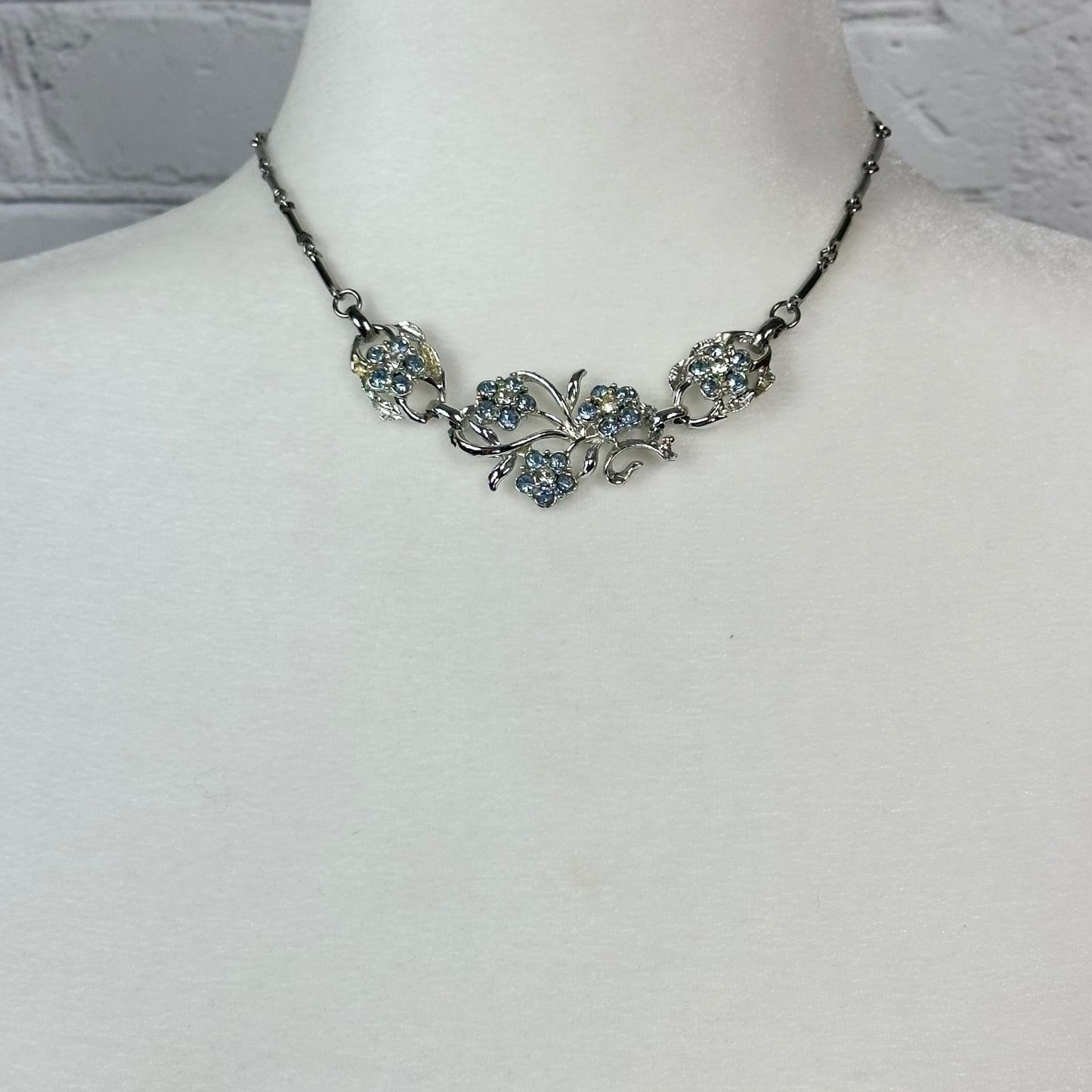 Aquamarine and White Crystal floral spray set in Rhodium Plating Necklace