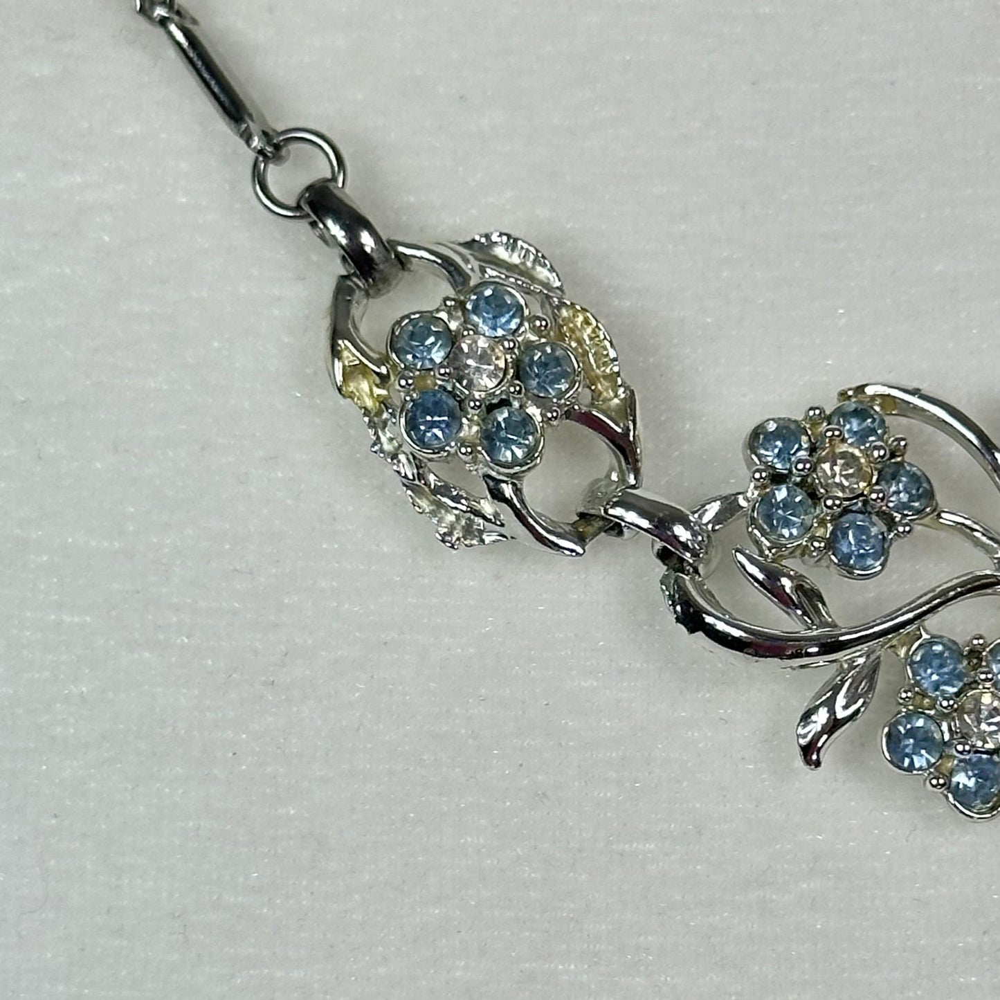 Aquamarine and White Crystal floral spray set in Rhodium Plating Necklace