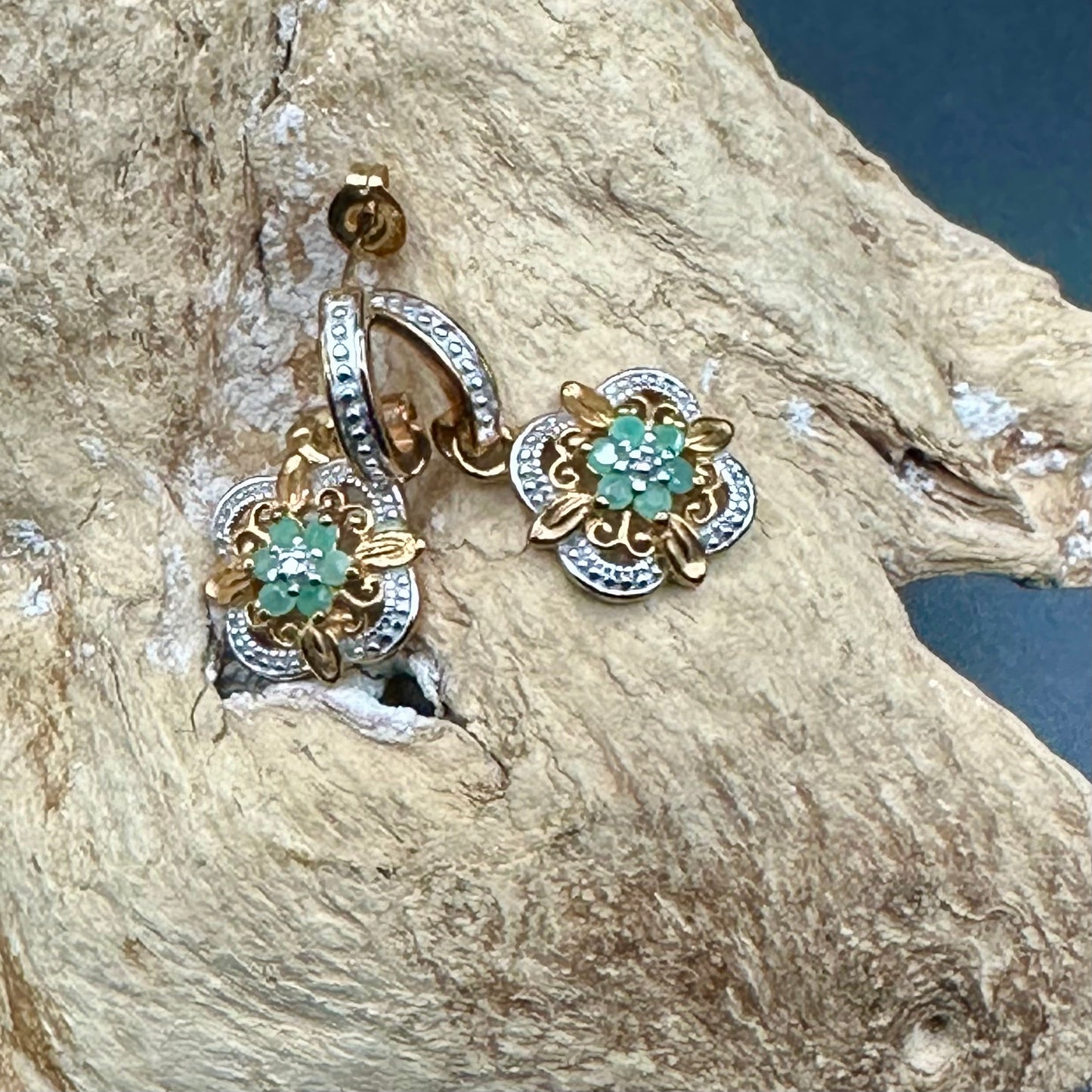 Emerald flower with diamond accent earrings in YG plated sterling silver