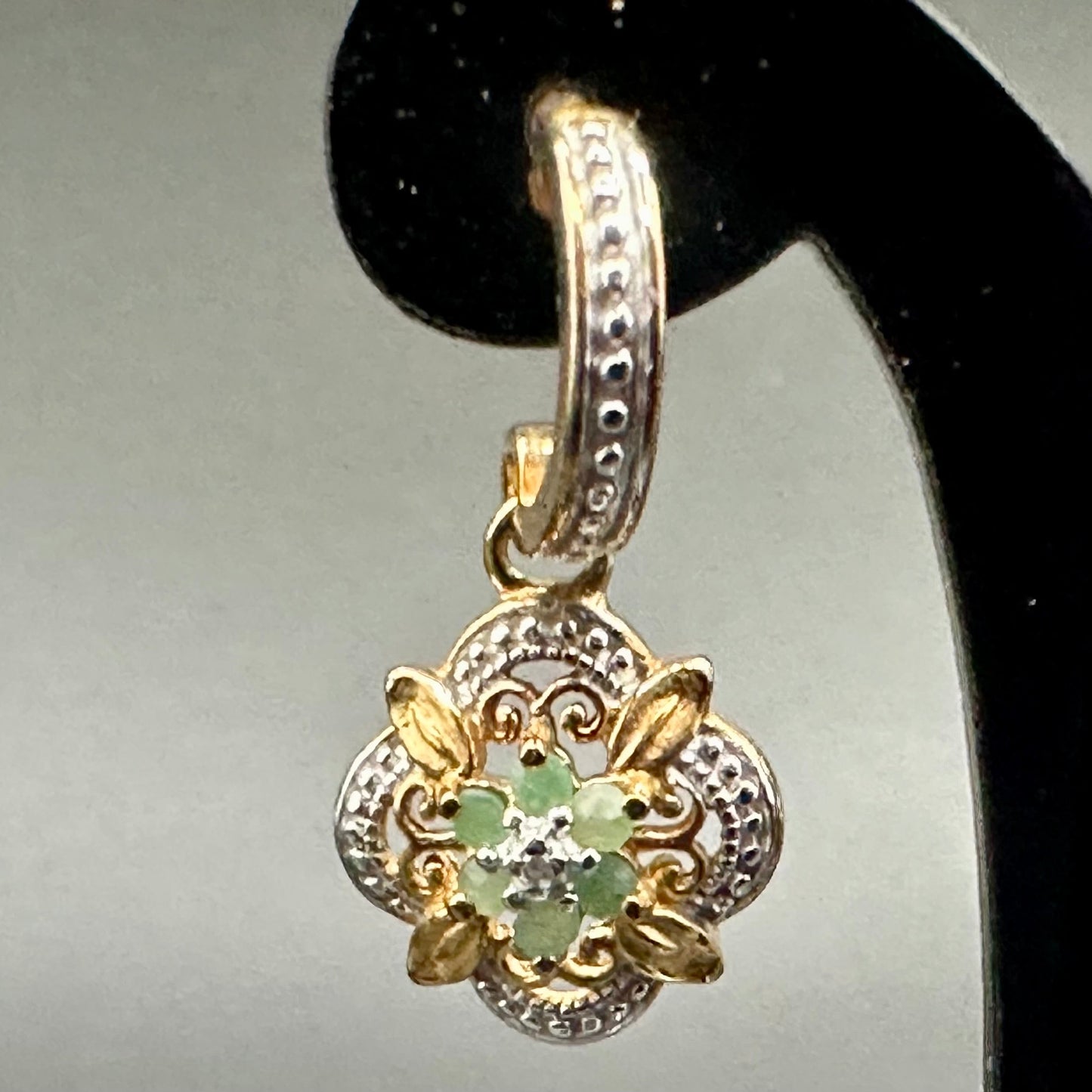 Emerald flower with diamond accent earrings in YG plated sterling silver