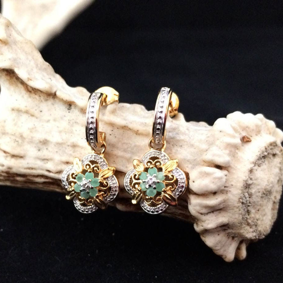 Emerald flower with diamond accent earrings in YG plated sterling silver