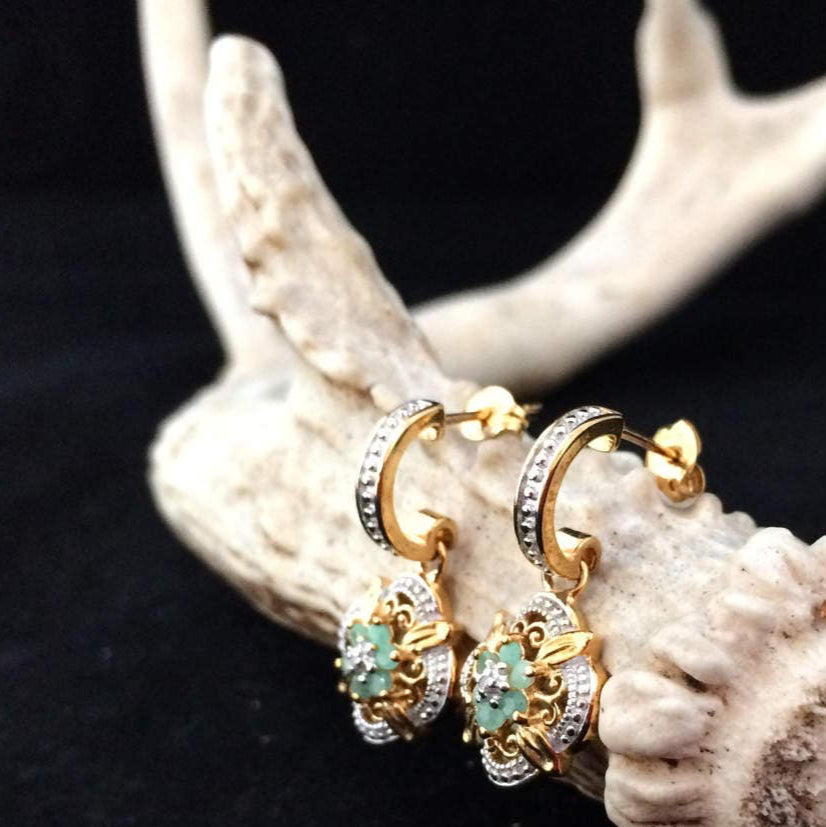 Emerald flower with diamond accent earrings in YG plated sterling silver