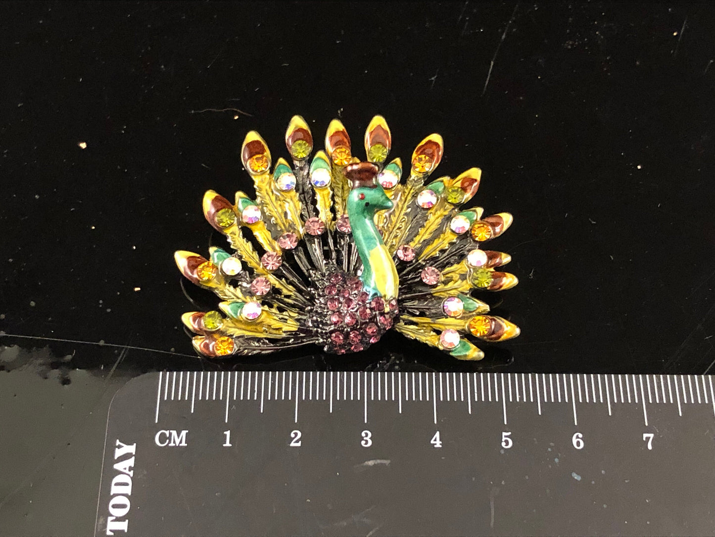Ann Primrose Brown, Purple and Green Peacock Brooch