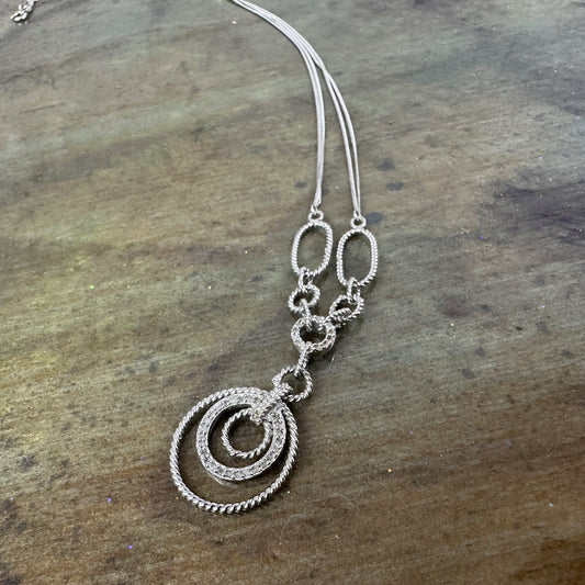 Filagree double chained necklace with diamond accents.