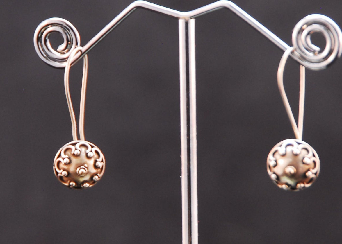 Sterling silver earrings with removable Checkerboard synthetic topaz stones.