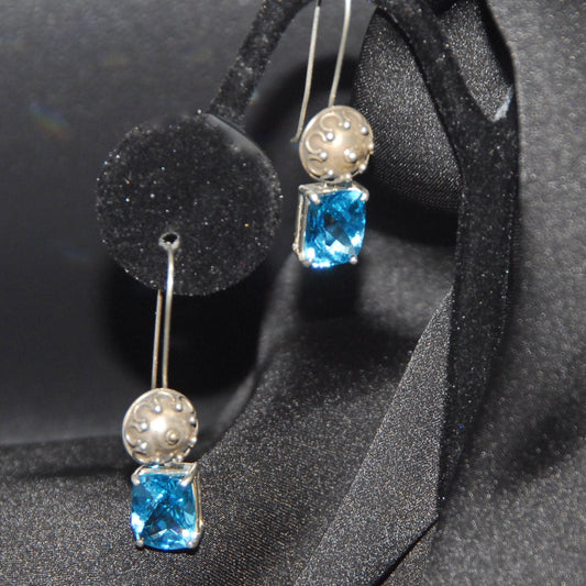 Sterling silver earrings with removable Checkerboard synthetic topaz stones.