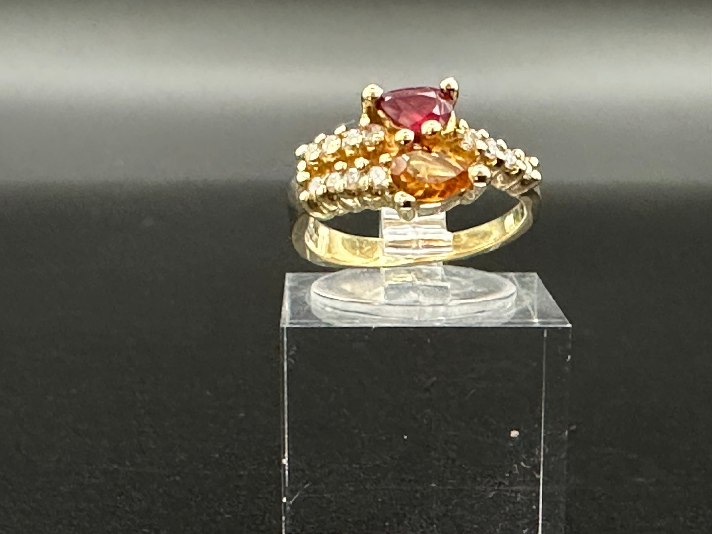 Citrine and Red Spinel bypass ring with diamond accents in 14K yellow gold
