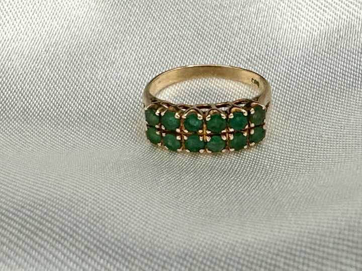 14K gold ring with 12 round cut Emeralds