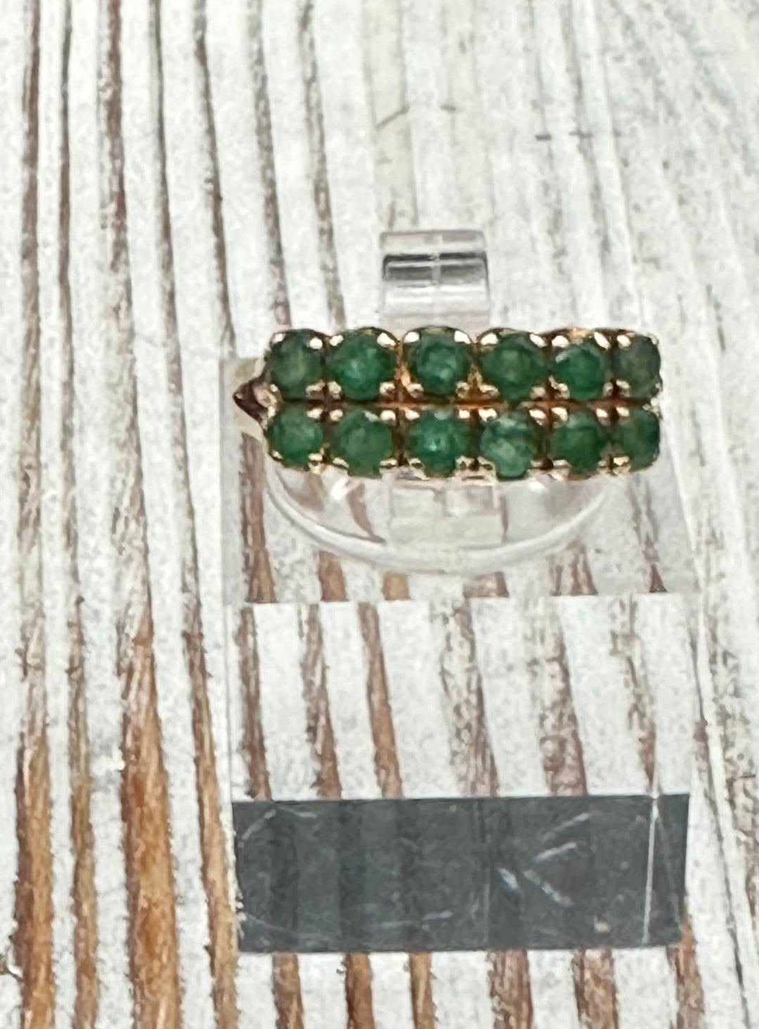 14K gold ring with 12 round cut Emeralds