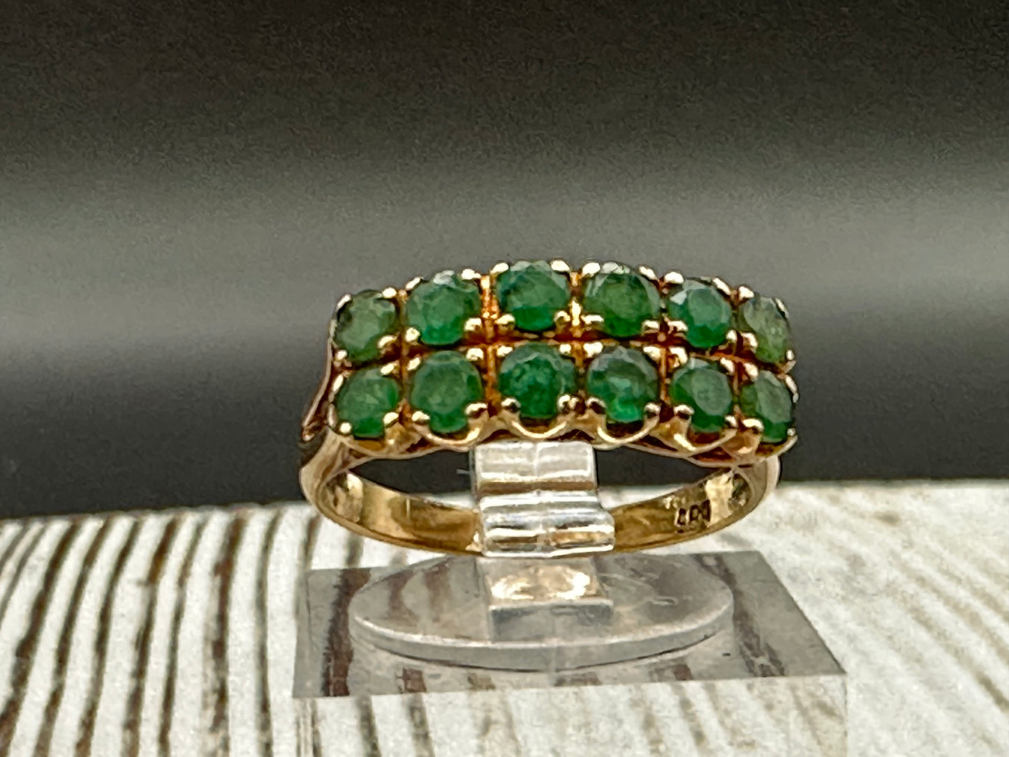 14K gold ring with 12 round cut Emeralds