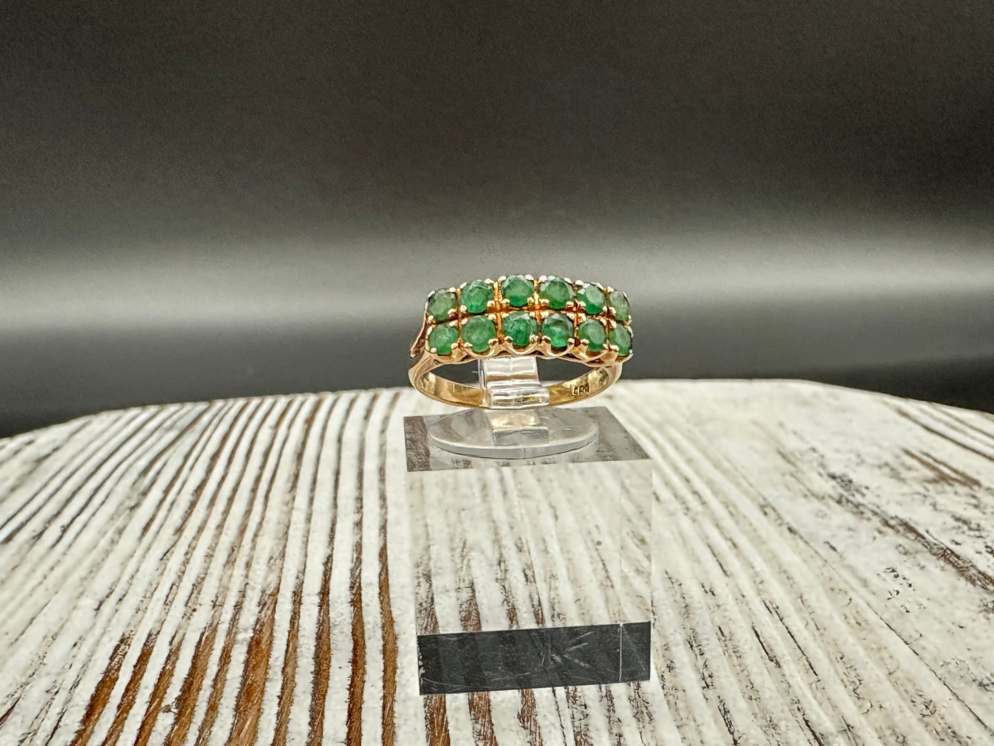 14K gold ring with 12 round cut Emeralds