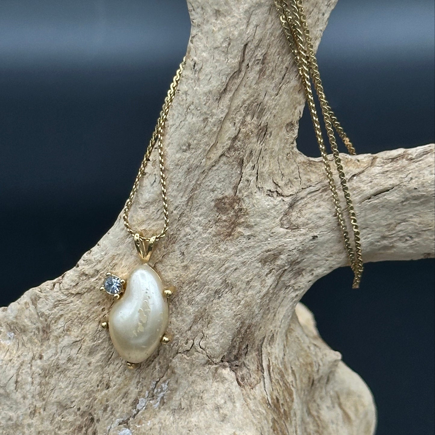 Faux pearl and Diamond pendant on Gold tone chain