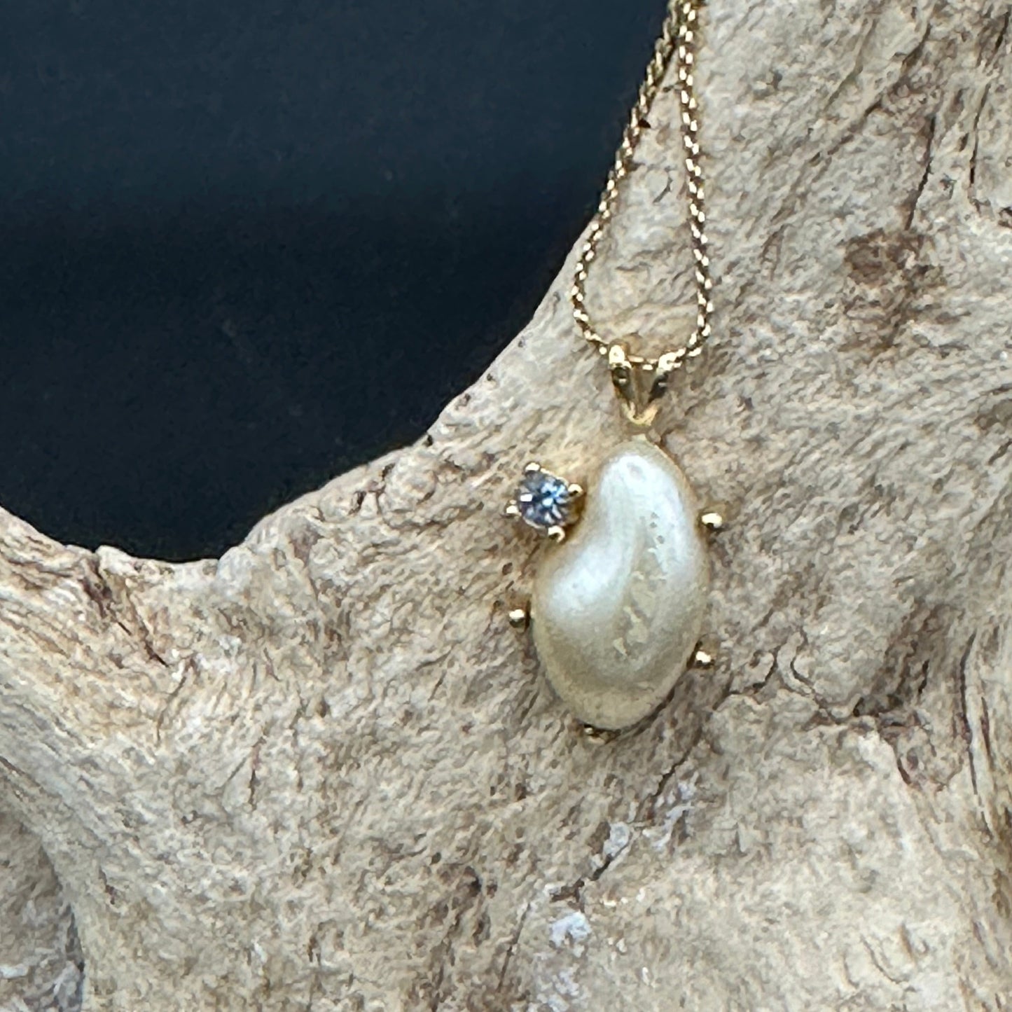 Faux pearl and Diamond pendant on Gold tone chain