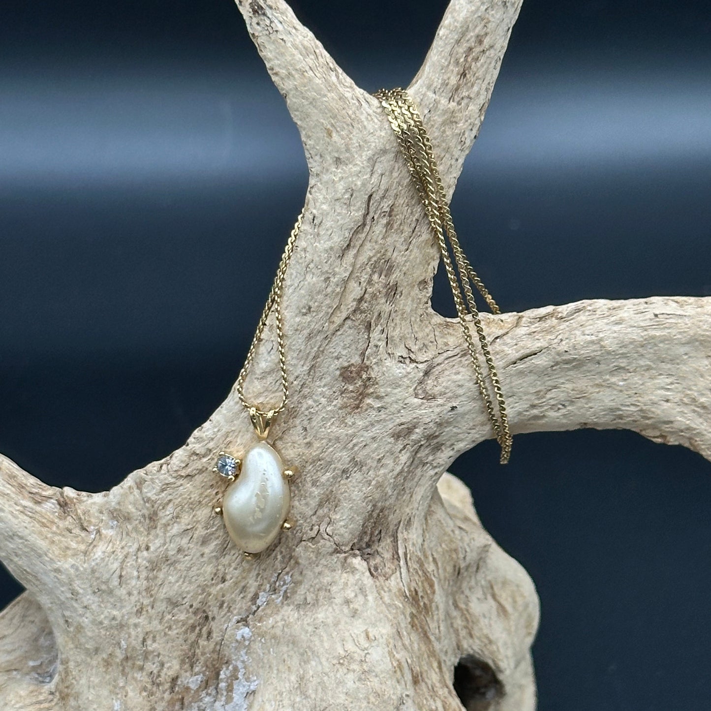 Faux pearl and Diamond pendant on Gold tone chain