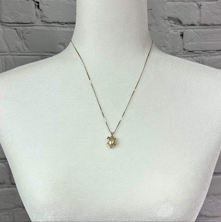 Faux pearl and Diamond pendant on Gold tone chain