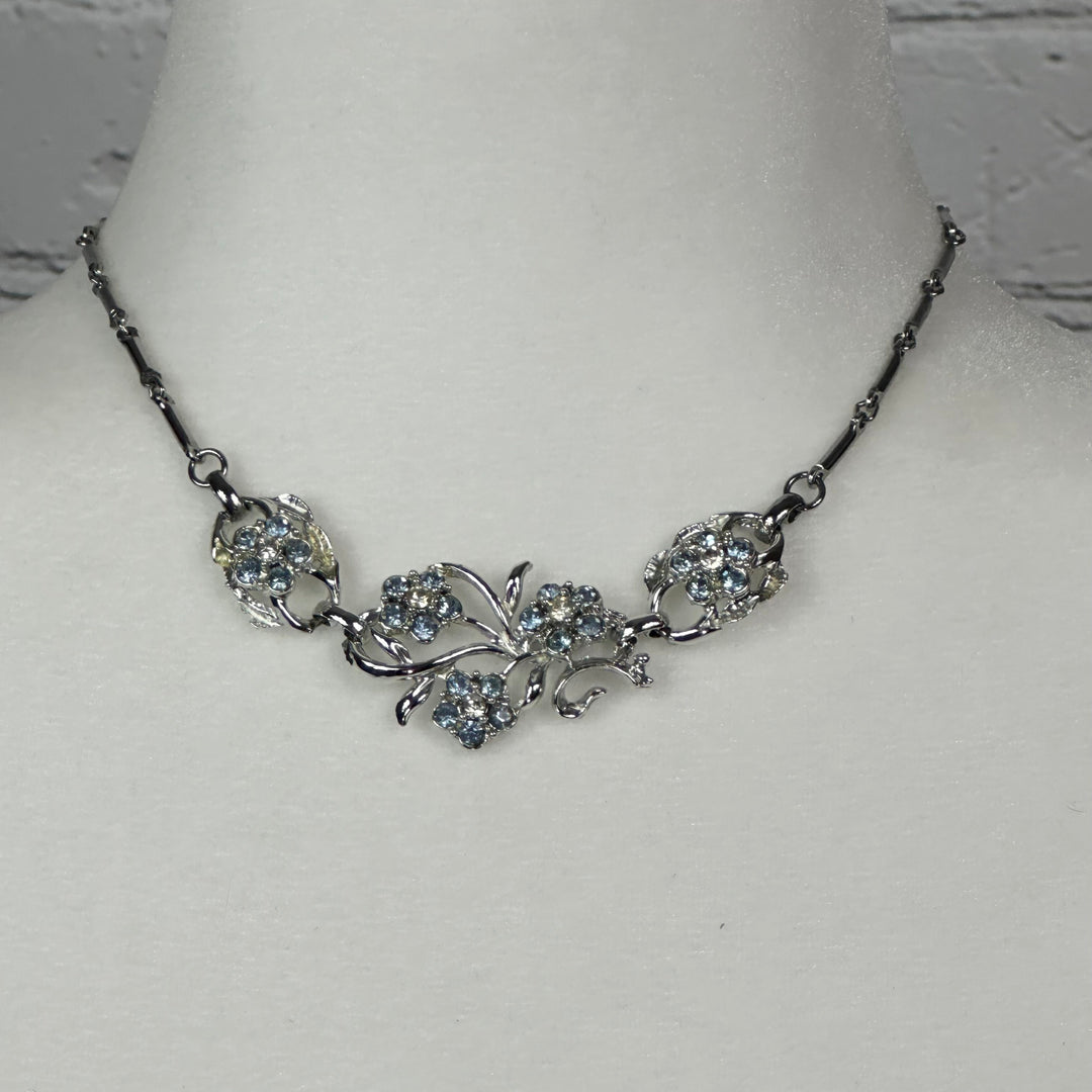 Aquamarine and White Crystal floral spray set in Rhodium Plating Necklace