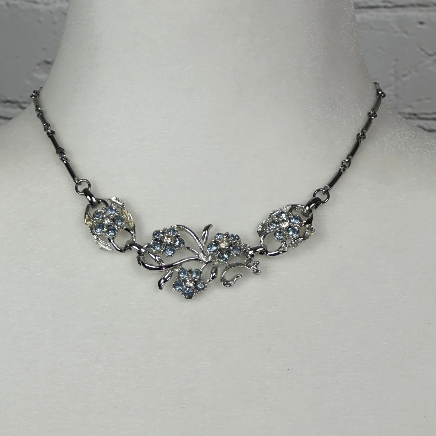 Aquamarine and White Crystal floral spray set in Rhodium Plating Necklace