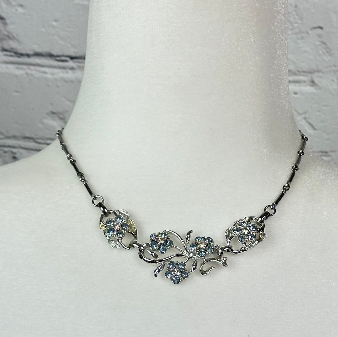 Aquamarine and White Crystal floral spray set in Rhodium Plating Necklace