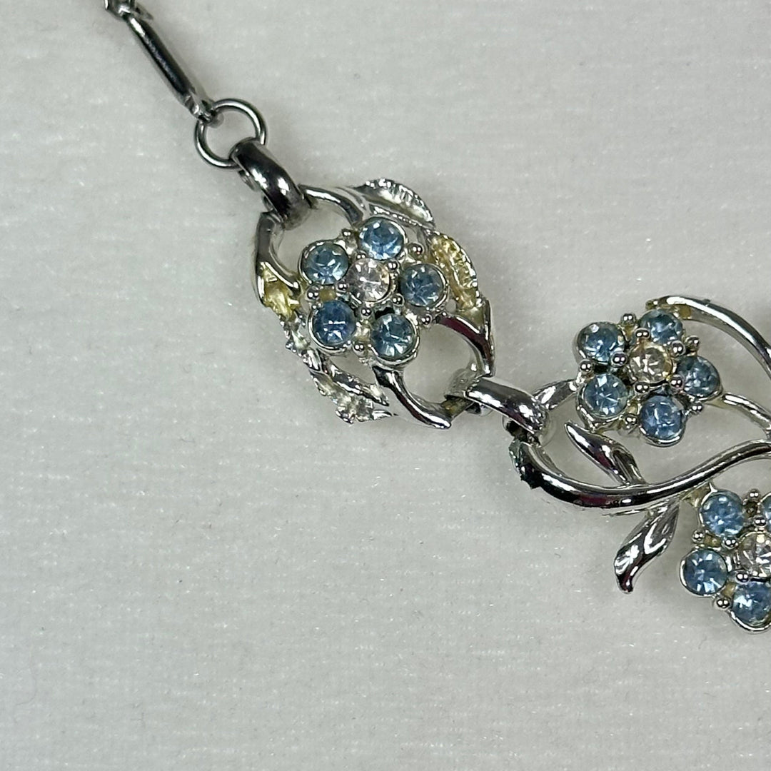 Aquamarine and White Crystal floral spray set in Rhodium Plating Necklace