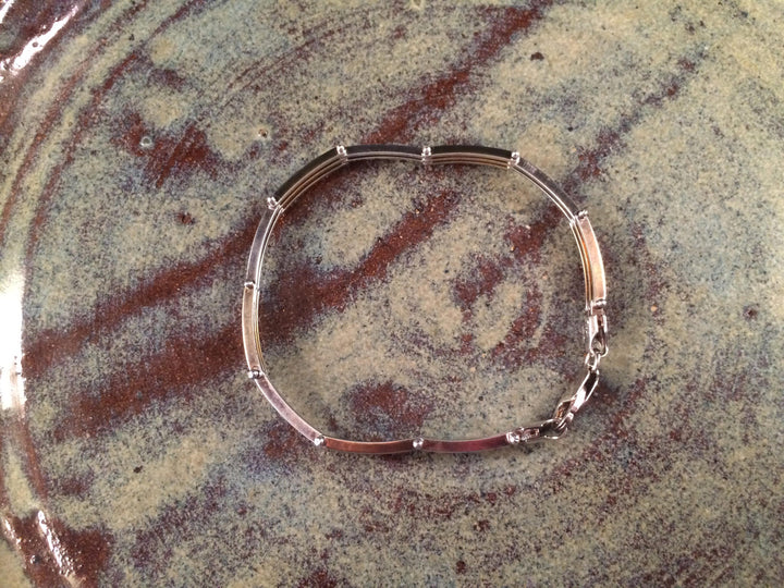 Alternating silver and gold plate link bracelet from Italy