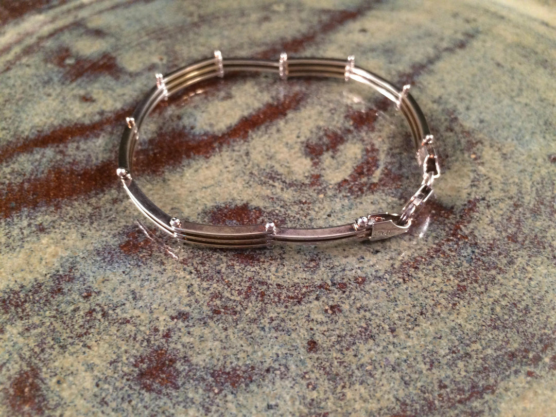 Alternating silver and gold plate link bracelet from Italy