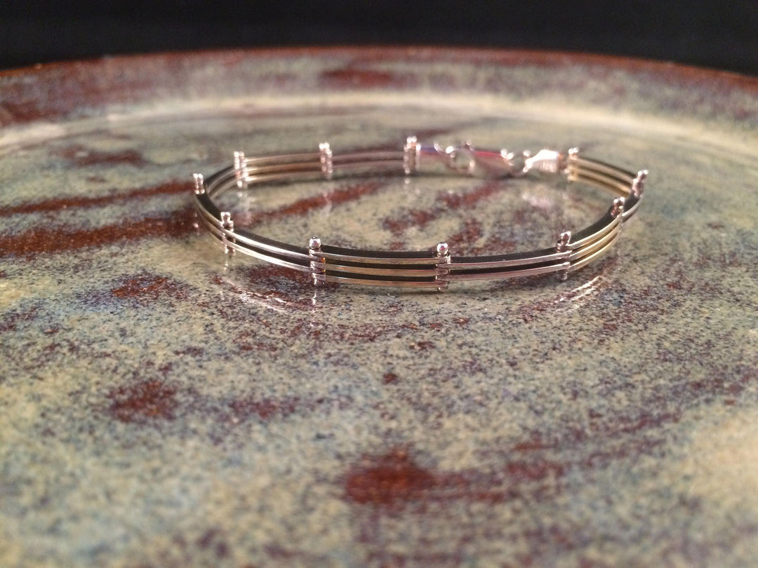 Alternating silver and gold plate link bracelet from Italy