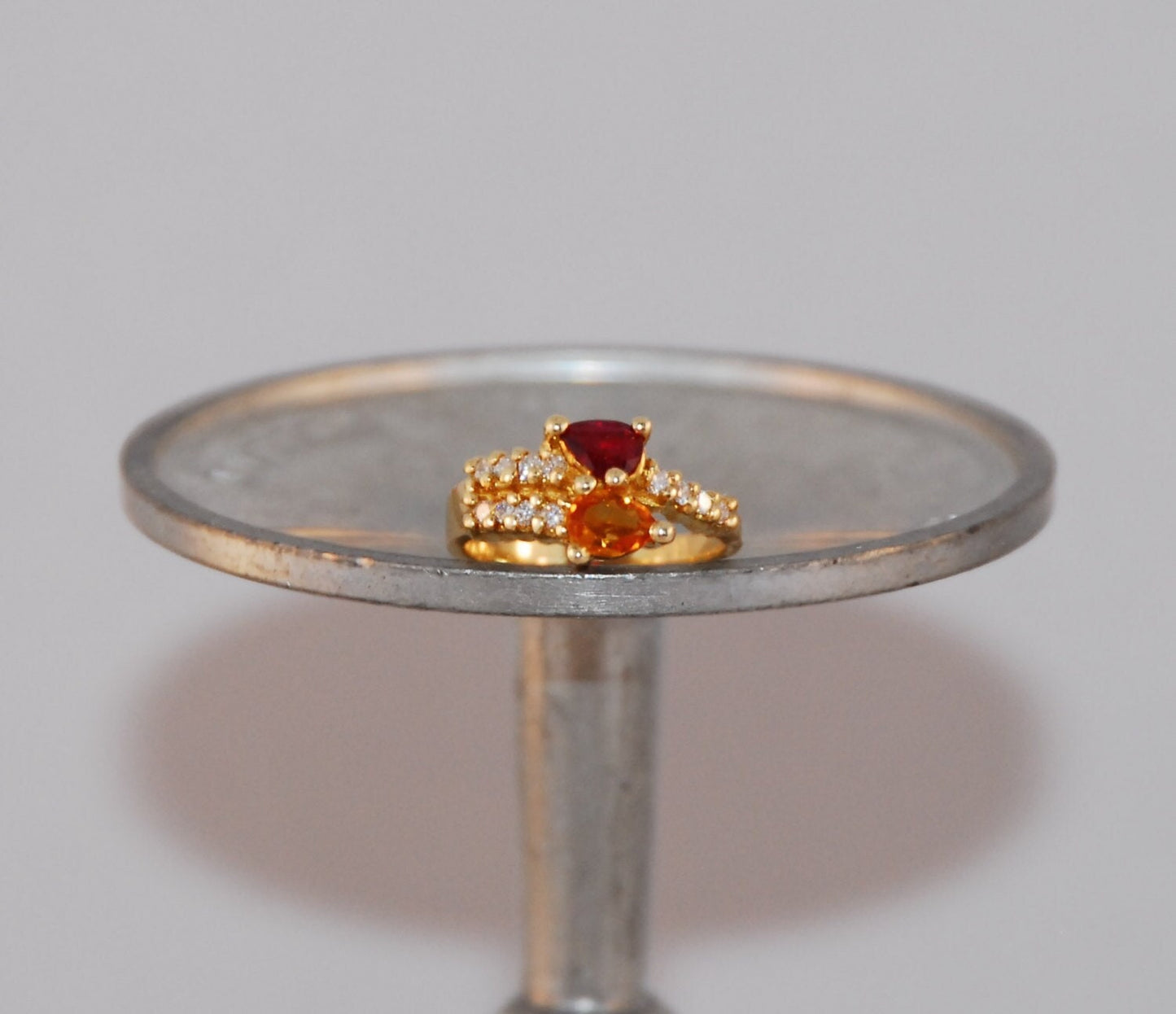 Citrine and Red Spinel bypass ring with diamond accents in 14K yellow gold