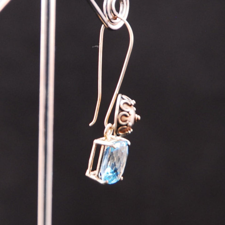 Sterling silver earrings with removable Checkerboard synthetic topaz stones.